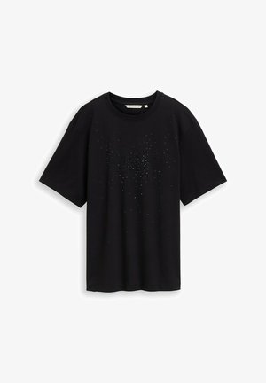 Must have musta T-särk musta värvi, lühikeste varrukatega, valmistatud puuvillast, mille esiküljel on väikesed läikivad kaunistused, mis moodustavad puhvri mustri.