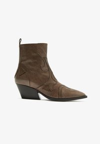 Sélectionné, dark beige