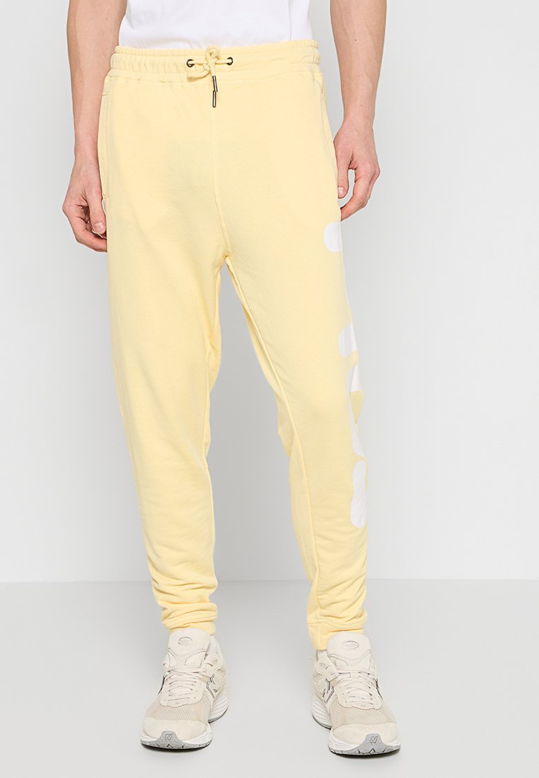 Fila Trainingsbroek lichtgeel Fila Trainingsbroek lichtgeel