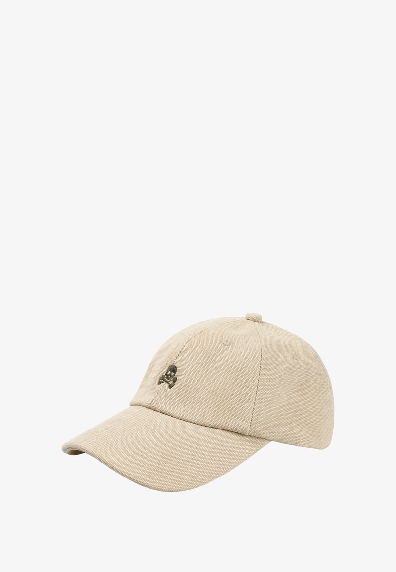 Beige cotton cap featuring a green embroidered skull and crossbones on the front, with a curved brim and adjustable strap at the back.