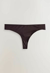 Black thong underwear made of smooth fabric, featuring a minimalist design with thin sides and a seamless finish.