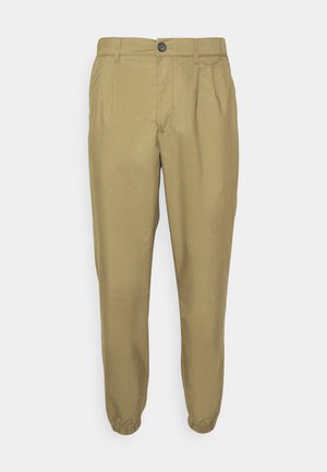 Khaki broek gemaakt van lichtgewicht stof, met een getailleerd ontwerp, elastische boorden en een enkele sluitknop aan de voorkant.