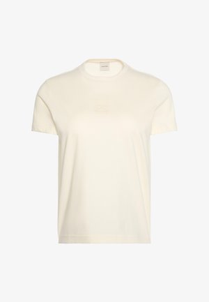 Απλό off-white κοντομάνικο T-shirt με στρογγυλή λαιμόκοψη, με διακριτικό ραμμένο ορθογώνιο σχέδιο στο στήθος και ετικέτα Calvin Klein στο εσωτερικό της λαιμόκοψης.