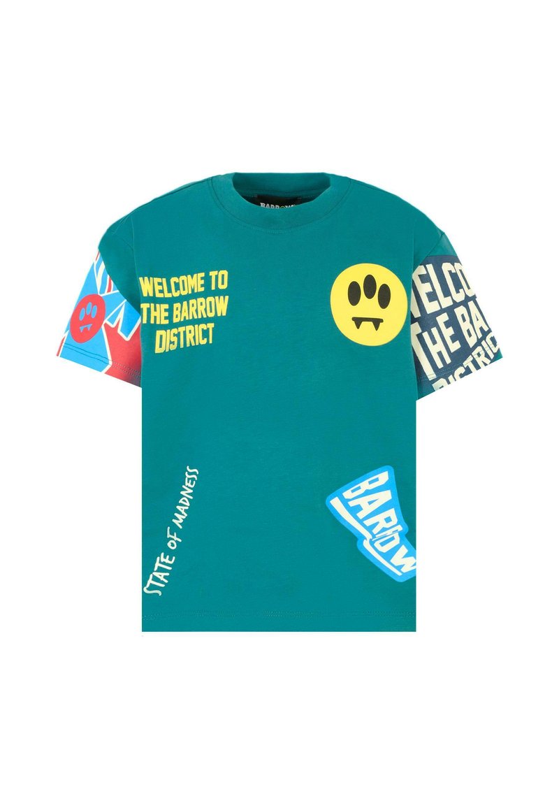 Turkusowa koszulka z krótkim rękawem z mixem kolorowych nadruków graficznych, w tym uśmiechnięte twarze i tekst, charakteryzująca się luźnym krojem i bawełnianym materiałem.