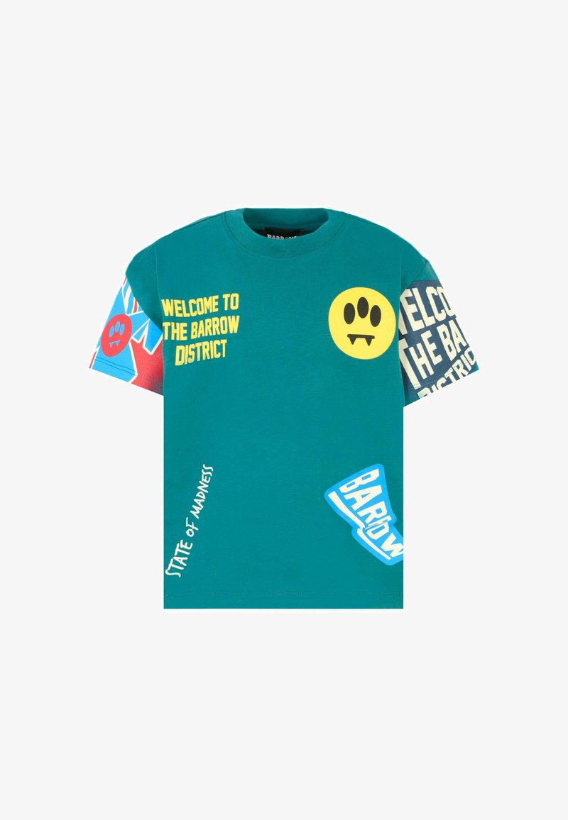 Turkusowa koszulka z krótkim rękawem z mixem kolorowych nadruków graficznych, w tym uśmiechnięte twarze i tekst, charakteryzująca się luźnym krojem i bawełnianym materiałem.