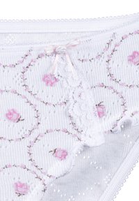 Weiße Strickunterwäsche mit pinkem Blumenmuster, Spitzenrand und einem kleinen pinken Schleifchen in der Mitte des vorderen Bundes.