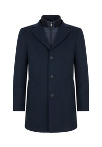 Granatowy wełniany płaszcz o dopasowanym kroju, z klapami, pięcioma guzikami i bocznymi kieszeniami. Wnętrze ma pikowaną warstwę.