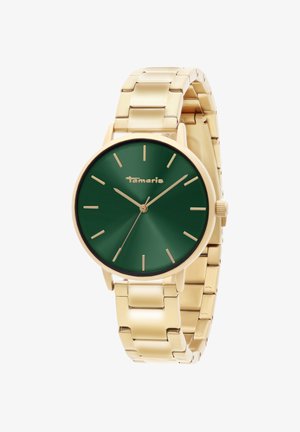 Goldfarbene Metallarmbanduhr mit grünem Zifferblatt, goldenen Stundenmarkierungen und Zeigern sowie einem miteinander verbundenen Armband im Stil eines Glieders.