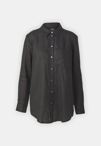 Chemise en lin noire à manches longues, boutonnée sur le devant, col à revers, poche poitrine unique, et coupe décontractée. Tissu doux et texturé.