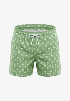 Short de bain vert avec motif de palmier blanc et taille à cordon blanc, conçu pour une tenue de plage décontractée.