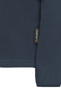 Tessuto in pile blu scuro con una consistenza morbida, dotato di un'etichetta Polartec cucita nella cucitura. Design semplice, senza motivi o accessori visibili.