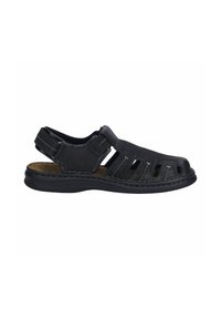 Black leather sandal with open design, adjustable strap, and textured sole. Features stitched accents and cut-out details for breathability.
