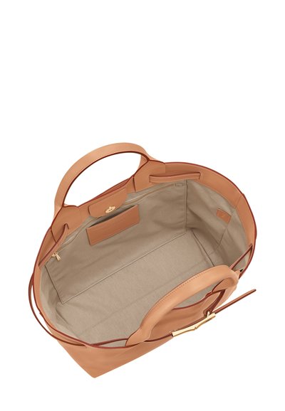 Tan leather tote bag with a spacious beige fabric interior, featuring a zip pocket and smooth handles. Seamless construction with minimal accents.