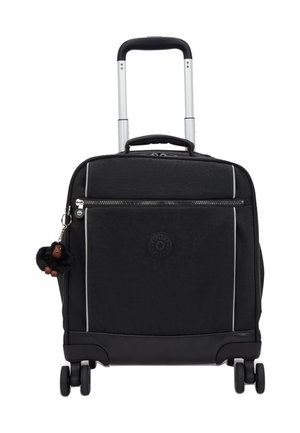 Black soft-shell carry-on suitcase with telescopic handle, front zip pocket, four wheels, and a small plush monkey keychain attached.