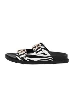 Infradito a strisce zebra in bianco e nero con due fascette regolabili e suola nera, caratterizzati da una superficie liscia e un design minimale.