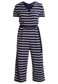 Combinaison à manches courtes rayée horizontale marine et grise, jambes larges et ceinture assortie à la taille avec boucle en métal.