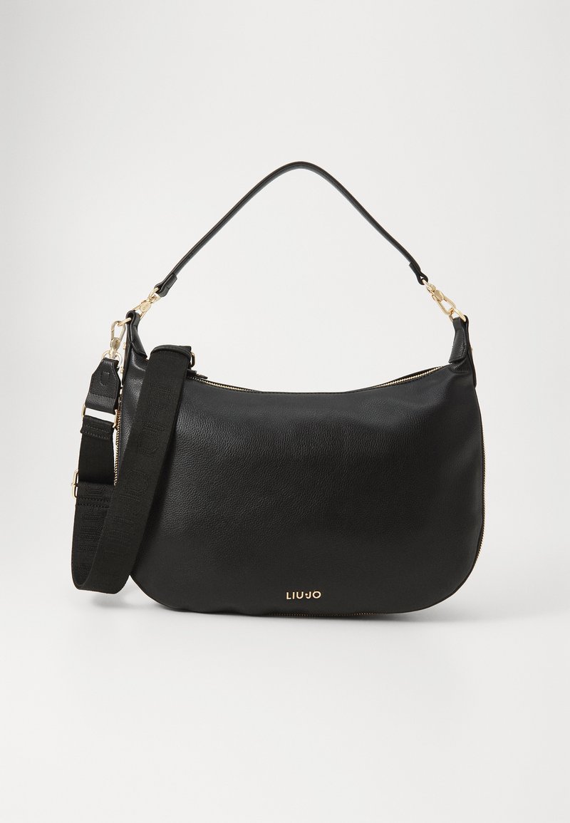 Black leather handbag with a curved shape, gold hardware, and a detachable shoulder strap. Features a zip closure and embossed brand logo.