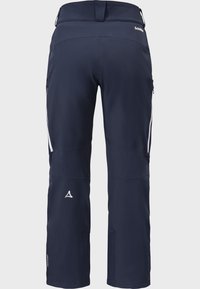 Námořnické modré voděodolné kalhoty s elegantním designem. Mají boční zipové kapsy a detaily s logem. Vyrobeny z odolného, flexibilního materiálu pro pohodlí.