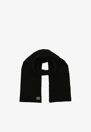 Black knitted scarf with a textured diamond pattern, featuring ribbed ends and a small metallic logo patch. Soft, warm fabric.