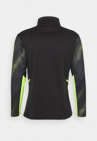 Schwarz langärmliges Shirt mit hohem Kragen. Die Ärmel haben ein auffälliges schwarzes und neongrünes Linienmuster. Hergestellt aus glattem, dehnbarem Stoff.