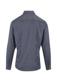 Langermet skjorte i mørkegrå, teksturert stoff. Har standardkrage og mansjetter med knapper, med rett rygg og skreddersydd passform.
