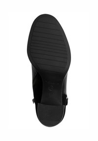 Mustmustel musta jalatsite talla tekstuursed haardepinnad, ümarate varvaste disain ja logotempel. Tallas on nähtav suurus 37.