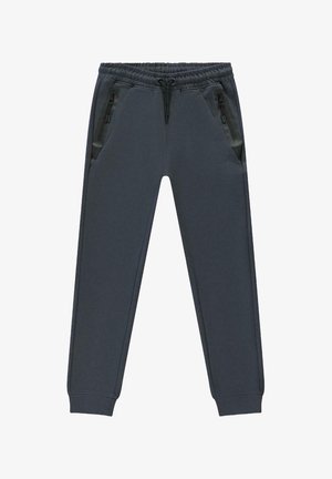 Fleece joggingbroek in donkergrijs. Voorzien van een elastische tailleband, verstelbare trekkoord en twee zijzakken met rits en contrasterende panelen.