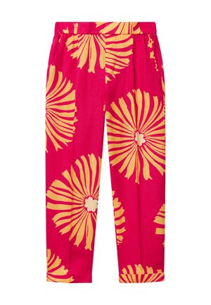 Pantalons floraux roses avec de grands motifs de fleurs jaunes, fabriqués en tissu léger, dotés d'une taille élastique et de jambes fuselées.