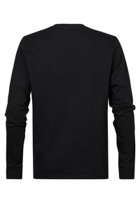 Musta pitkähiha T-paita, jossa on pyöreä kaula-aukko, valmistettu pehmeästä kankaasta. Ominaisuuksiin kuuluvat saumattomat olkapäät ja istuvat hihansuut. Ei näkyviä logoja tai kuvioita.