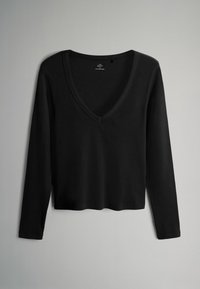 Maglietta nera a maniche lunghe con scollo a V profondo e texture a coste. Design semplice senza embellishments, adatta per essere indossata a strati o da sola.