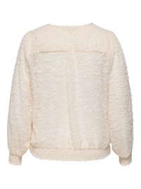 Krämfärgad blus med texturerat blommönster, rundad urringning och puffiga ärmar. Resår i nederkant och ärmslut ger struktur. Vy bakifrån.