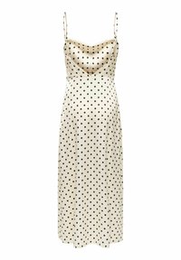 Robe nuisette en satin couleur crème avec des pois noirs, fines bretelles et un col bénitier drapé, longueur midi.