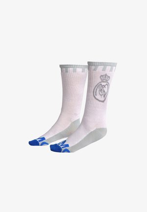 Weiße Socken mit grauen Akzenten, versehen mit einem großen Logo und einem Kronendesign. Blaue Zehenpartien mit blauen "M"-Buchstaben auf den Sohlen.