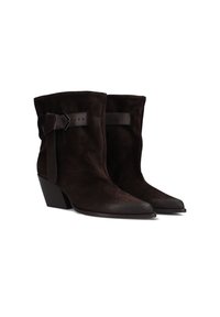 Brown suede ankle boots with a pointed toe, featuring a side strap with a buckle and a stacked heel. Smooth texture and sleek design.