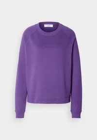 Violetti pitkähiha, pyöreäkauluksinen collegepaita, jossa on joustavat hihat ja helma. Paidassa on huomaamaton "Marc O'Polo Denim" -teksti rinnassa.