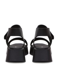 Cesare Gaspari Sandály na platformě - black