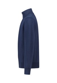 Merinovillaneulepusero tummansinisestä materiaalista, jossa on korkea kaulus, pitkät hihat sekä ribbaus hihansuissa ja helmassa. Tasainen rakenne, yksivärinen.