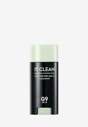 Blackhead cleansing stick in a black tube with green accents. Label reads "IT CLEAN G9 SKIN." Smooth texture, cylindrical shape.