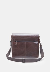 Brown leather messenger bag with a flap and adjustable canvas strap. Features a front zip pocket and a smooth, textured surface.