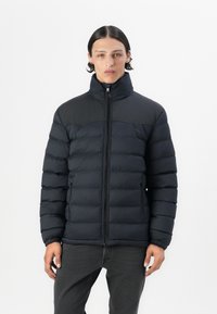 Black puffer jacket with a high collar and front zipper, featuring horizontal quilted segments and side zip pockets.