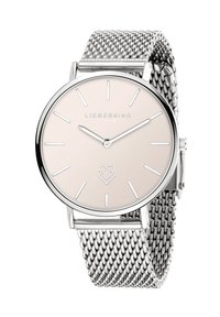 Zilveren mesh horloge met een ronde, lichtroze wijzerplaat, zilveren uurmarkeringen en een klein hartlogo onderaan.