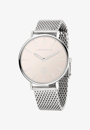 Sølv mesh rem ur med en rund, lys pink urskive, sølv timemarker og et lille hjerte-logo nederst.