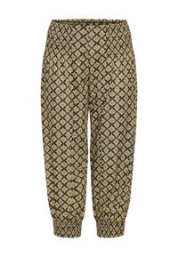 Pantalons à motif noir et or avec une taille élastique et des chevilles fuselées, présentant un design géométrique en losange.