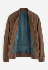 Braune Bomberjacke mit durchgehendem Reißverschluss, gerippten Bündchen und einem tealfarbenen Innenfutter mit dezentem Muster. Keine Taschen auf der Außenseite sichtbar.