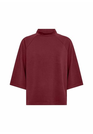 Maglione corto a maniche corte color bordeaux con vestibilità ampia e maniche raglan, in tessuto semplice, esposto su sfondo bianco.