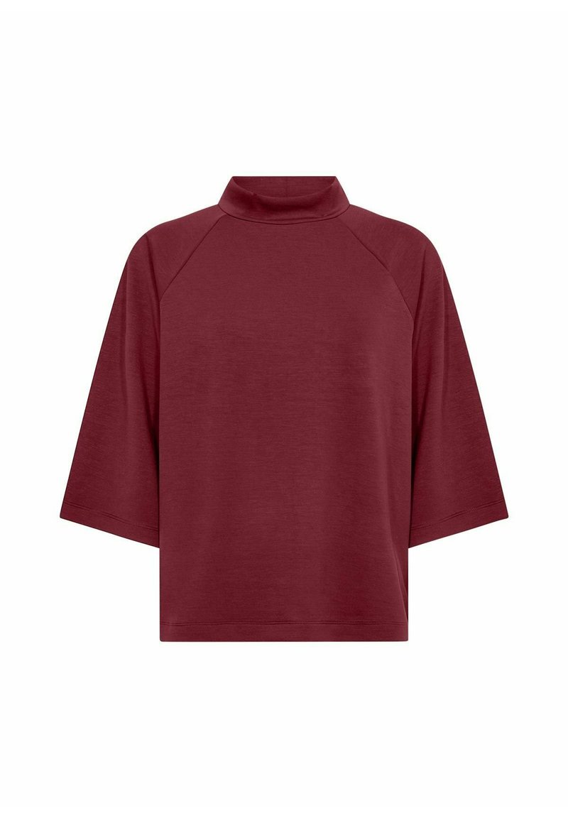 Maroon lyhyet hihat turtleneck-toppi, jossa on löysä mitoitus ja raglan-hihat, sileä kangas, esitelty valkoista taustaa vasten.