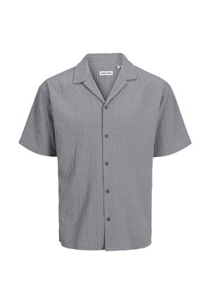 Chemise à manches courtes, boutonnée, en tissu gris texturé avec un motif carré subtil, dotée d'un col ouvert et de boutons foncés.