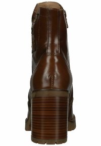 Bruine leren enkelboot met een stevige, geribbelde houten hak. Heeft decoratieve stiksels en een zichtbare rits aan de zijkant.