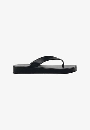 Sorte flip-flop sandaler med flad sål, glat gummistrop og minimalistisk design. Letvægtig med en strømlinet form.