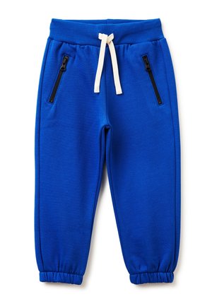 Lyseblå joggingbukser med elastisk talje og manchetter, med hvid snor og to sorte lynlåslommer foran.
